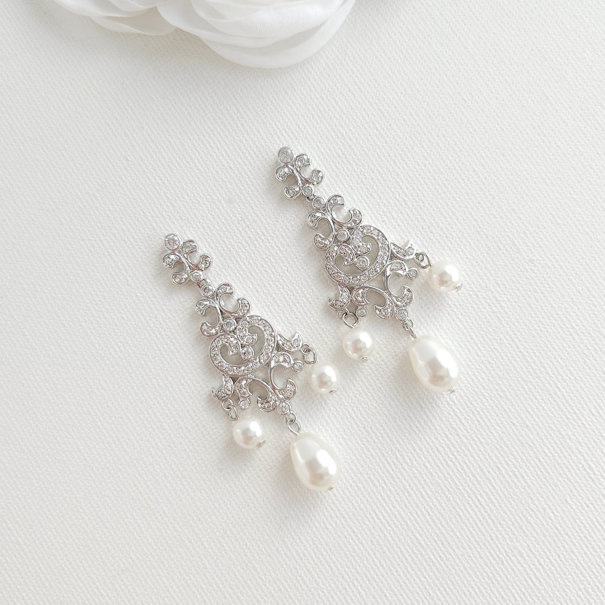 vintage style pearl drop chandelier earrings featuring cubic zirconia and flawless round crystal pearls.